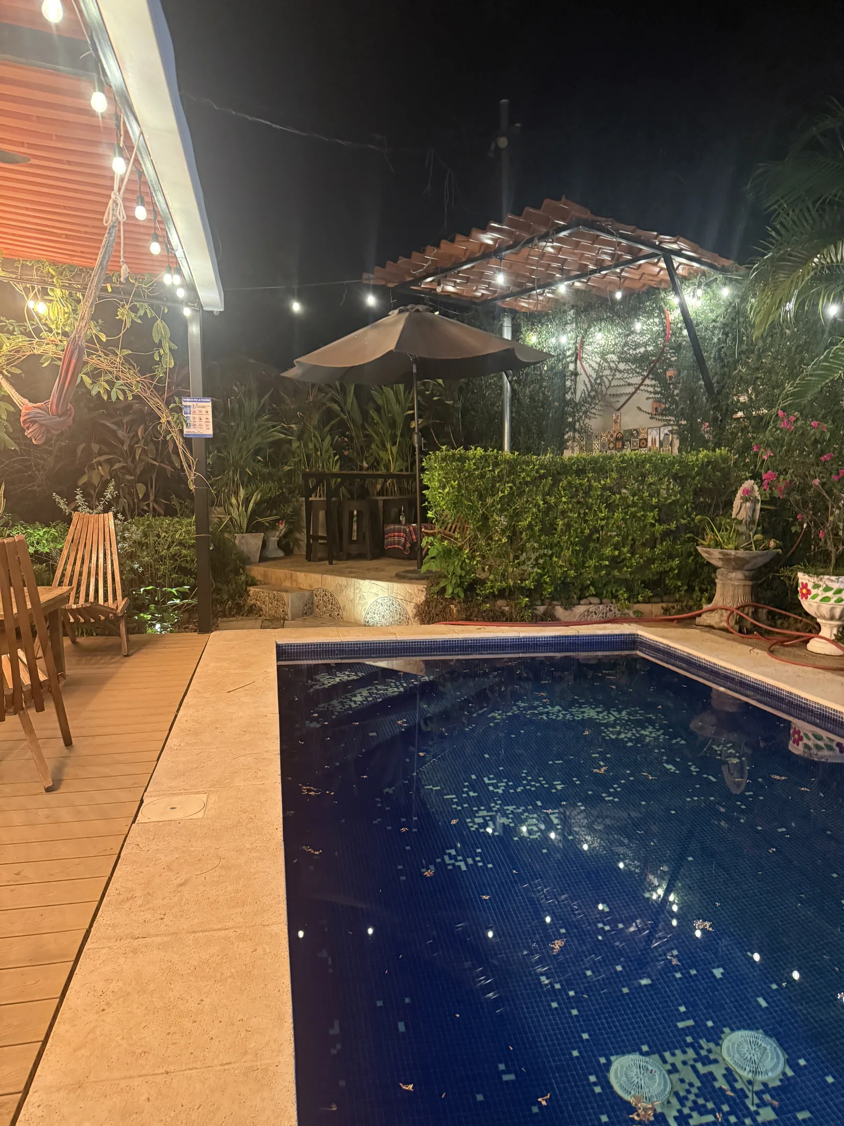 Lit pool and outdoor lounge