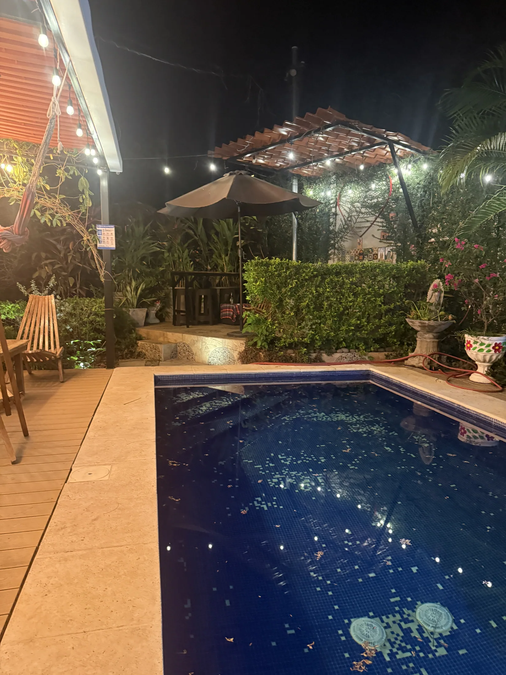 Lit pool and outdoor lounge