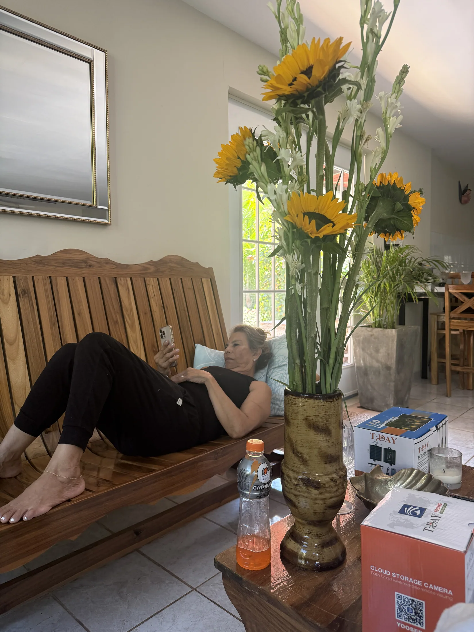 Tropical flowers and lounge